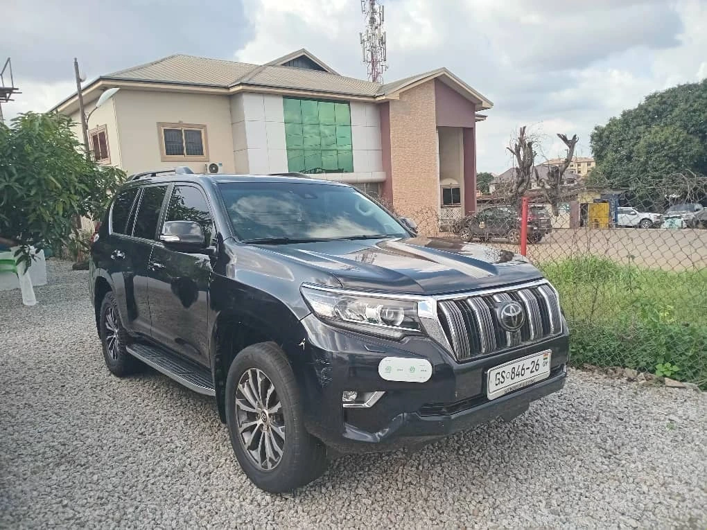 Toyota Land Cruiser on a scenic road